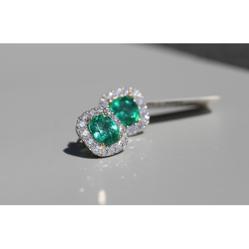 14 - Pair of Attractively Detailed, Emerald Set Centre Stone Earrings with Diamond Halo Set Surround, Mou... 