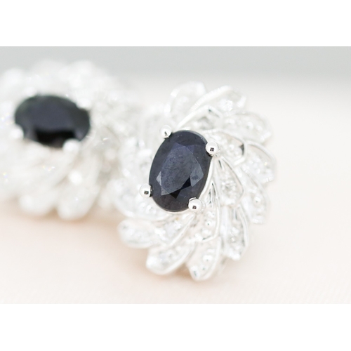 16 - Pair of Finely Detailed Sapphire and Diamond Cluster Set Earrings, Mounted in 9 Carat White and Yell... 