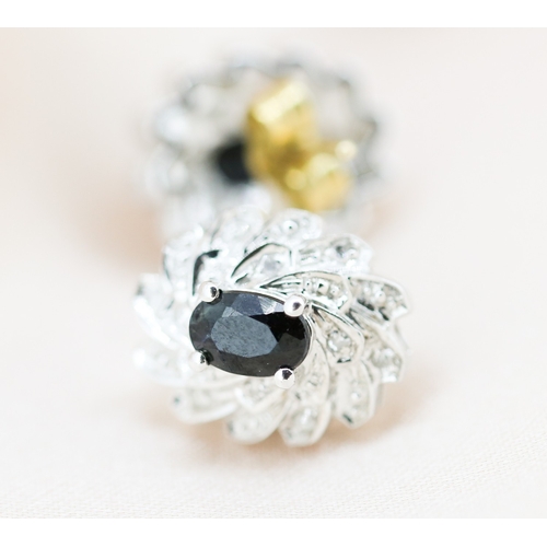 16 - Pair of Finely Detailed Sapphire and Diamond Cluster Set Earrings, Mounted in 9 Carat White and Yell... 