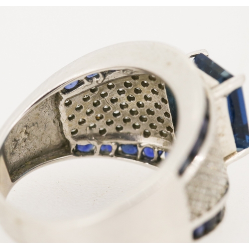 18 - Attractively Detailed Blue Tourmaline Set Ring with Diamond Cluster Set Surround, Further Set with S... 