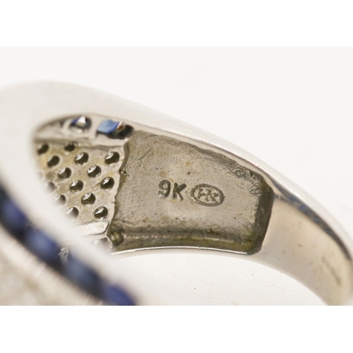 18 - Attractively Detailed Blue Tourmaline Set Ring with Diamond Cluster Set Surround, Further Set with S... 