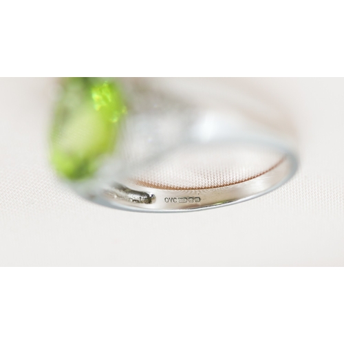 2 - Finely Detailed Peridot Set Ring with Diamond Cluster Set Shoulders, Mounted in 9 Carat White Gold, ... 