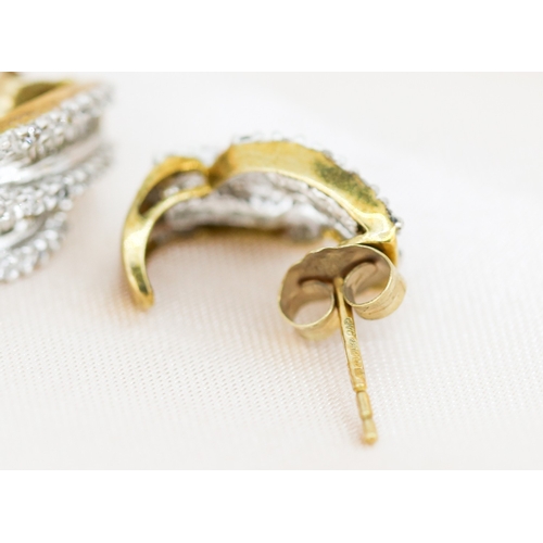 25 - Pair of Diamond Cluster Set, Ribbon Form Earrings, Mounted in 9 Carat Yellow Gold 1.5cm High