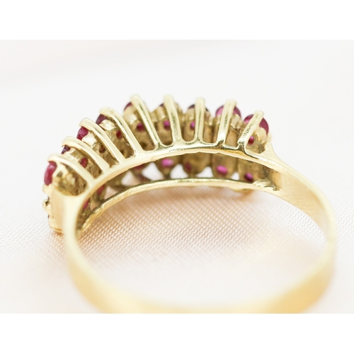 27 - Attractively Detailed, Rubellite and Diamond Set Three Row Ring, Mounted in 14 Carat Yellow Gold, Ri... 