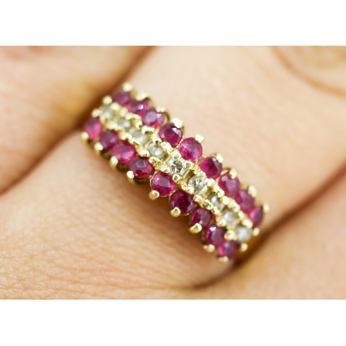 27 - Attractively Detailed, Rubellite and Diamond Set Three Row Ring, Mounted in 14 Carat Yellow Gold, Ri... 