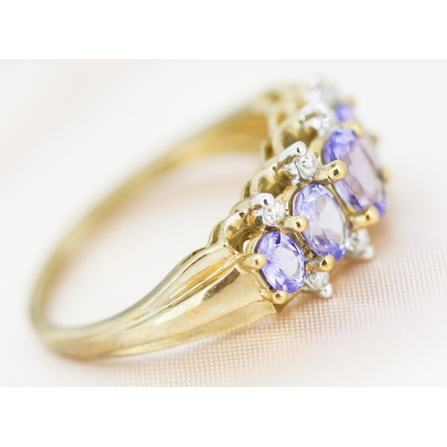 31 - Attractively Detailed, Tanzanite Five Stone Set Ring, Graduated Form with Further Diamond Insets, Mo... 