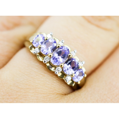 31 - Attractively Detailed, Tanzanite Five Stone Set Ring, Graduated Form with Further Diamond Insets, Mo... 