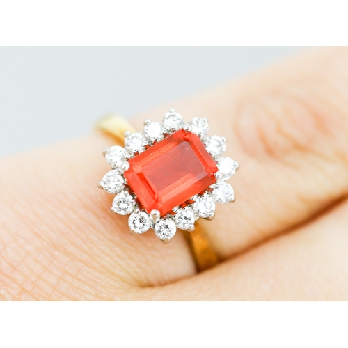 33 - Emerald Cut Fire Opal Set Ring with Moissanite Set Halo, Mounted in 18 Carat Yellow Gold Ring Size L