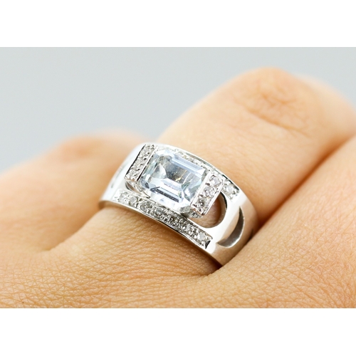 34 - Unusual Form, Emerald Cut Aquamarine Set Ring with Diamond Set Surround, Mounted in 18 Carat White G... 