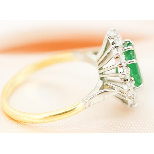 36 - Finely Detailed, Emerald Centre Stone Ring with Ten Round Cut Diamond Set Halo and Further Marquise ... 