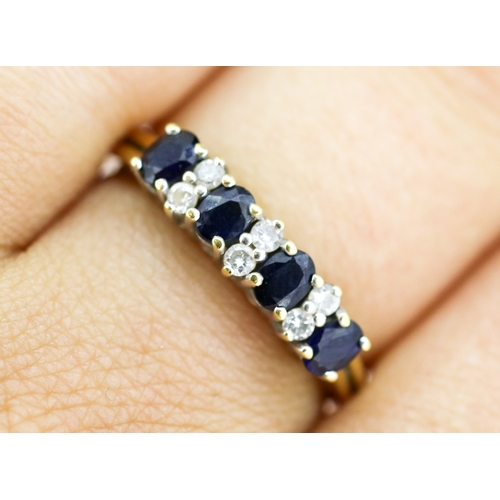 37 - Sapphire Four Stone Set Ring with Further Diamond Insets, Mounted in 18 Carat Yellow Gold, Ring Size... 