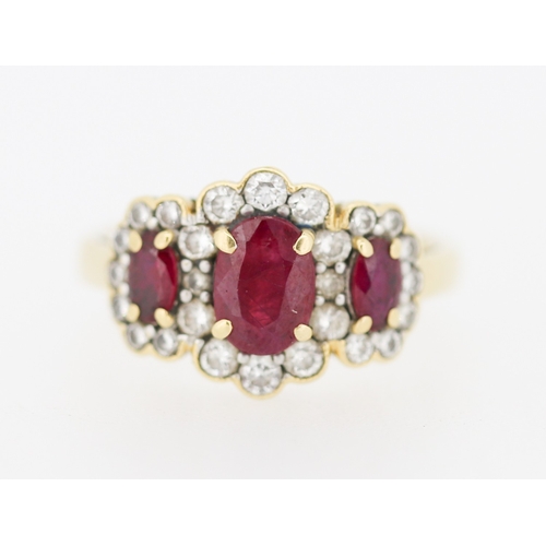 Finally Detailed, Ruby Three Stone Ring with Diamond Set Triple Halo Surround, Mounted in 18 Carat Yellow Gold, Ring Size N
