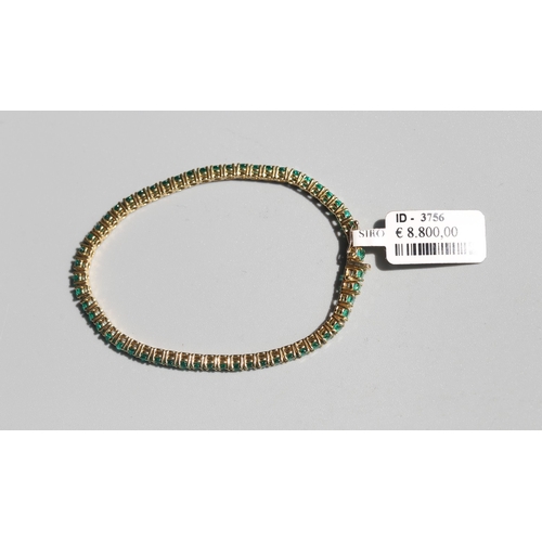 53 - Emerald Fifty-Six Stone Set Tennis Bracelet, Mounted in 18 Carat Yellow Gold, Total Emerald Carat We... 