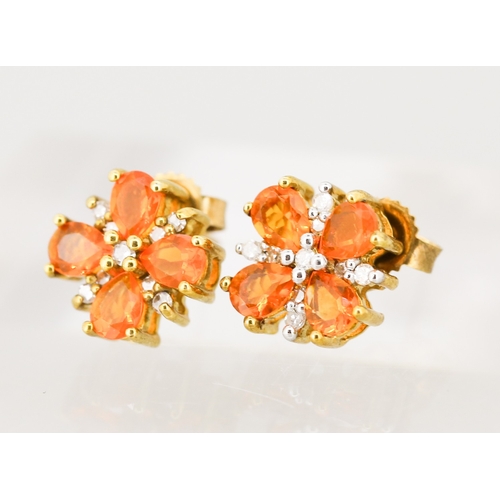 55 - Pair of Spessartite Garnet Four Stone Set Earrings with Further Diamond Insets, Mounted in 9 Carat Y... 