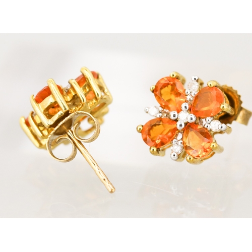 55 - Pair of Spessartite Garnet Four Stone Set Earrings with Further Diamond Insets, Mounted in 9 Carat Y... 