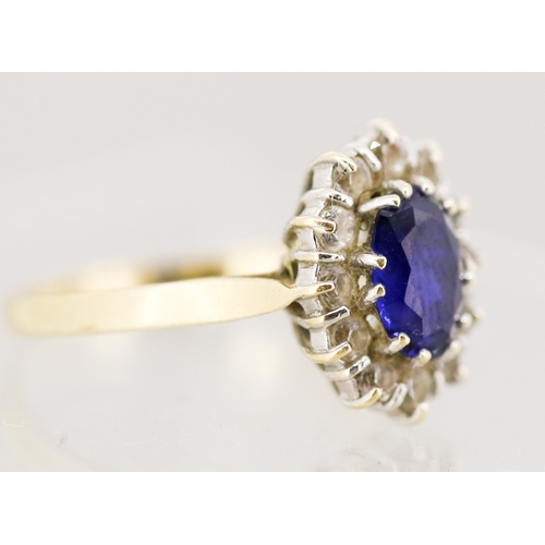 6 - Sapphire Set Ring with Cubic Zirconia Set Halo Surround, Mounted in 14 Carat Yellow Gold, Ring Size ... 