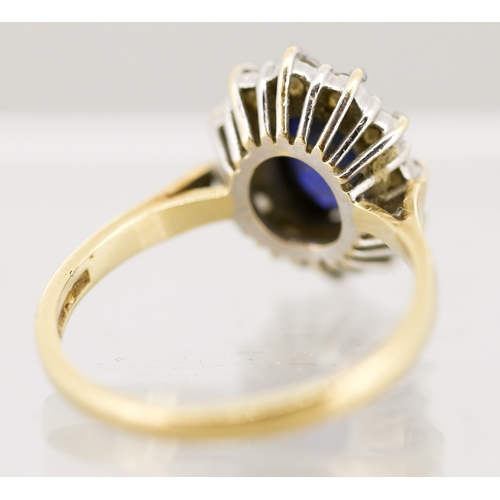 6 - Sapphire Set Ring with Cubic Zirconia Set Halo Surround, Mounted in 14 Carat Yellow Gold, Ring Size ... 