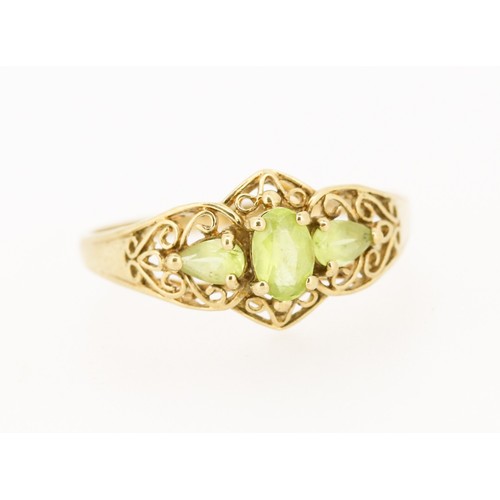 59 - Finely Detailed, Peridot Three Stone Set Ring with Filigree Detail, Mounted in 9 Carat Yellow Gold, ... 