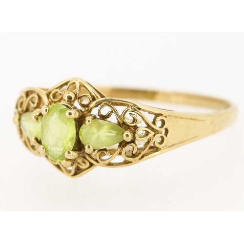 59 - Finely Detailed, Peridot Three Stone Set Ring with Filigree Detail, Mounted in 9 Carat Yellow Gold, ... 