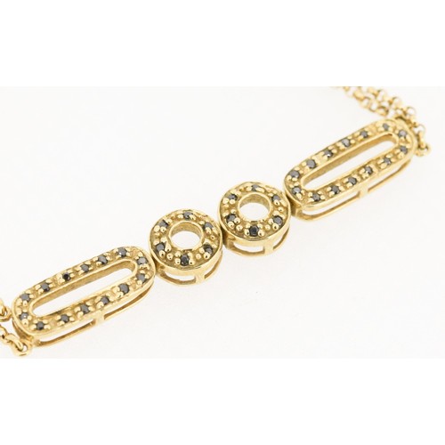 60 - Unusual Form Sapphire Cluster Set Mixed Link Bracelet with Double Chain Detail, Mounted in 9 Carat Y... 