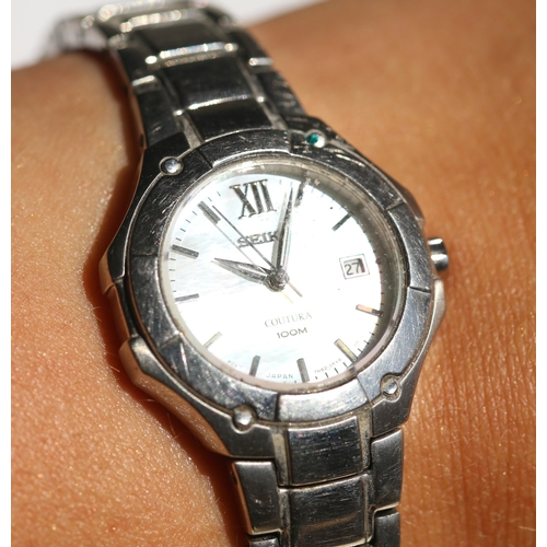 2 - Seiko Coutura Ladies Silver Tone Wristwatch, Japan Movement, Mother of Pearl Dial with Date Aperture