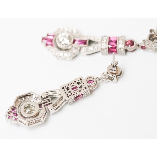 22 - Pair of Finely Detailed Diamond Centre Stone Set Drop Earrings with Baguette Cut, Round Cut Ruby and... 