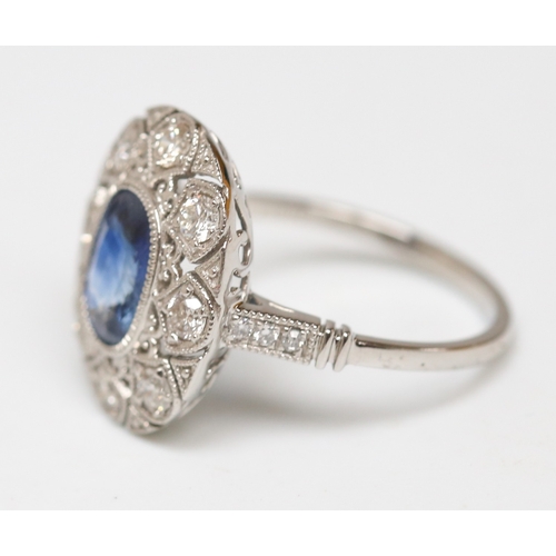 23 - Finely Detailed Bezel Set Sapphire Centre Stone Ring with Diamond Eight Stone Set Filigree Surround ... 
