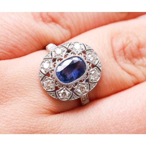23 - Finely Detailed Bezel Set Sapphire Centre Stone Ring with Diamond Eight Stone Set Filigree Surround ... 