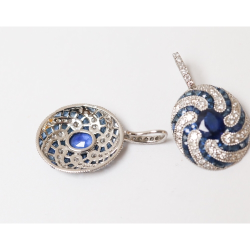25 - Pair of Finely Detailed Sapphire Centre Stone Set Earrings with Diamond and Sapphire Swirl Motif Set... 