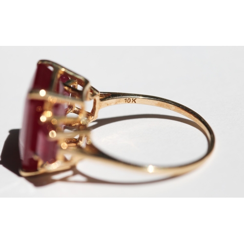3 - Baguette Cut Ruby Three Stone Ring, Mounted in 10 Carat Yellow Gold, Ring Size P and a Half