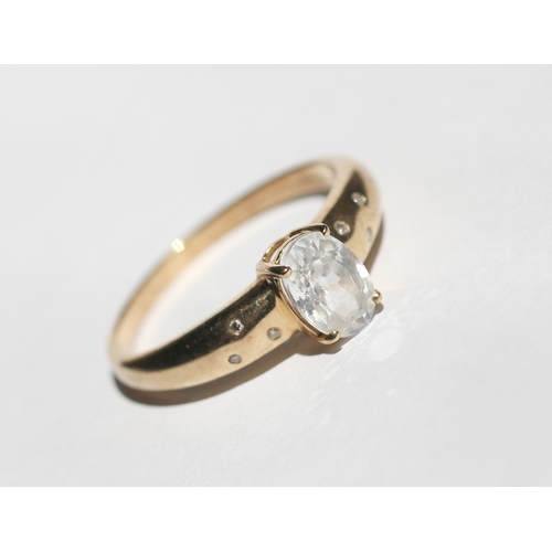 31 - Pale Aquamarine Set Ring with Bezel Set Diamond Inset to Shoulders, Mounted in 9 Carat Yellow Gold, ... 