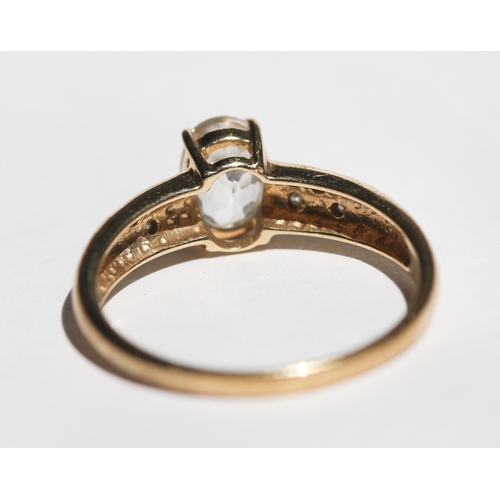 31 - Pale Aquamarine Set Ring with Bezel Set Diamond Inset to Shoulders, Mounted in 9 Carat Yellow Gold, ... 