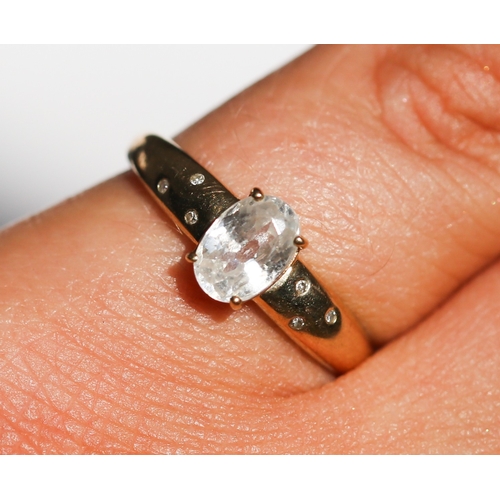 31 - Pale Aquamarine Set Ring with Bezel Set Diamond Inset to Shoulders, Mounted in 9 Carat Yellow Gold, ... 