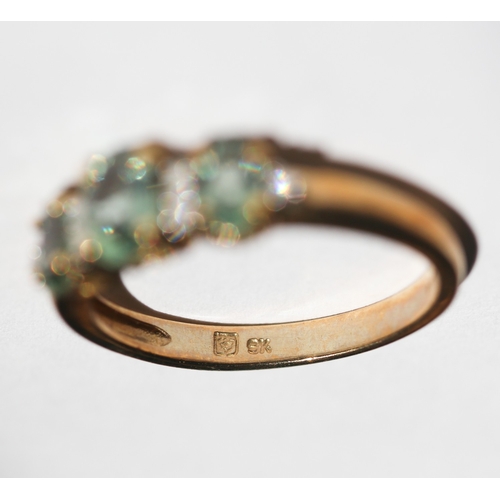 35 - Green Amethyst Three Stone Set Ring with Further Diamond Insets, Mounted in 9 Carat Yellow Gold, Rin... 