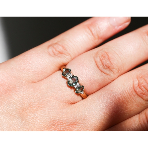35 - Green Amethyst Three Stone Set Ring with Further Diamond Insets, Mounted in 9 Carat Yellow Gold, Rin... 