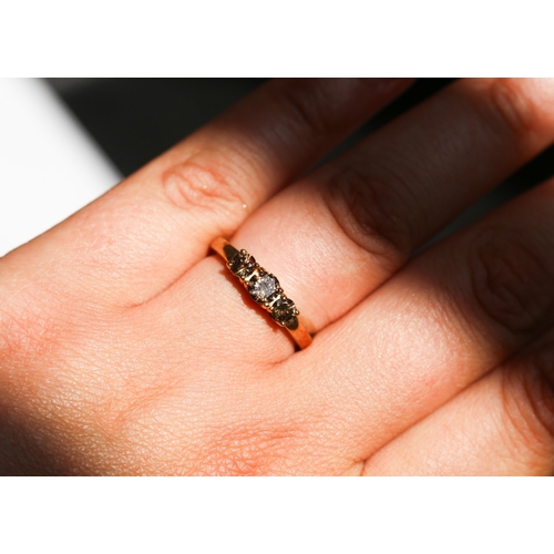 36 - Cognac Diamond Three Stone Ring, Mounted in 9 Carat Yellow Gold, Ring Size N