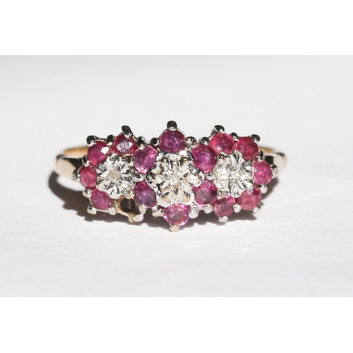 Attractively Detailed Ruby and Diamond Set TriCluster Ring, Mounted in 9 Carat Yellow Gold, Ring Size P and a Half