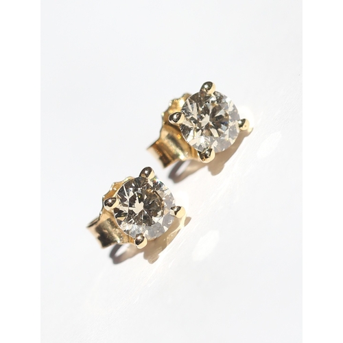 41 - Pair of Round Brilliant Cut Diamond Solitaire Earrings, Mounted in 14 Carat Yellow Gold, Total Diamo... 