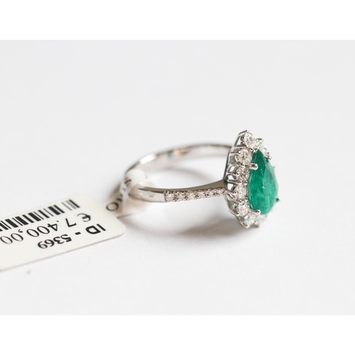 56 - Finely Detailed, Pear Cut Colombian Emerald Set Ring with Diamond Set Surround and Further Diamonds ... 