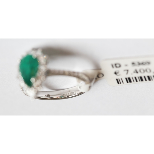 56 - Finely Detailed, Pear Cut Colombian Emerald Set Ring with Diamond Set Surround and Further Diamonds ... 