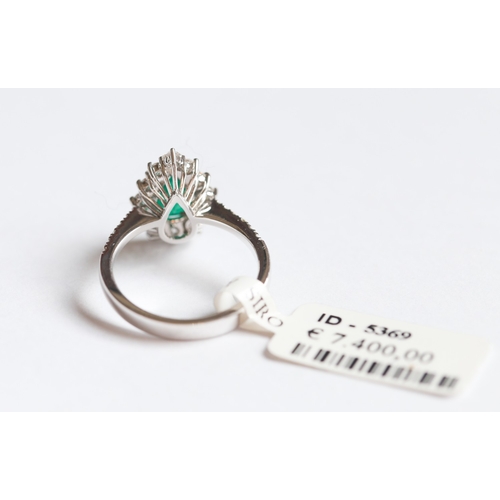 56 - Finely Detailed, Pear Cut Colombian Emerald Set Ring with Diamond Set Surround and Further Diamonds ... 