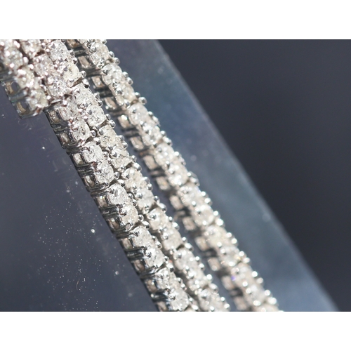 59 - Pair of Attractively Detailed, Diamond Set Four Row Graduated Form Drop Earrings, Mounted in 18 Cara... 