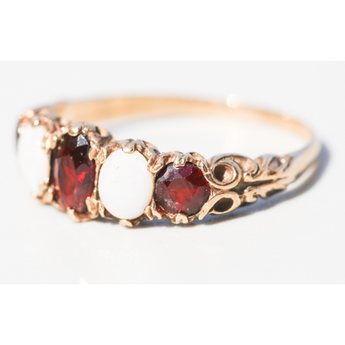 18 - Attractively Detailed, Garnet and Opal Set Five Stone Graduated Form Ring, Mounted in 9 Carat Yellow... 