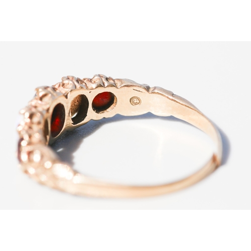 18 - Attractively Detailed, Garnet and Opal Set Five Stone Graduated Form Ring, Mounted in 9 Carat Yellow... 