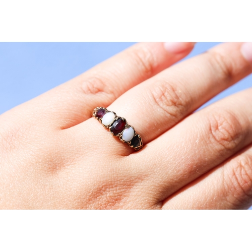 18 - Attractively Detailed, Garnet and Opal Set Five Stone Graduated Form Ring, Mounted in 9 Carat Yellow... 