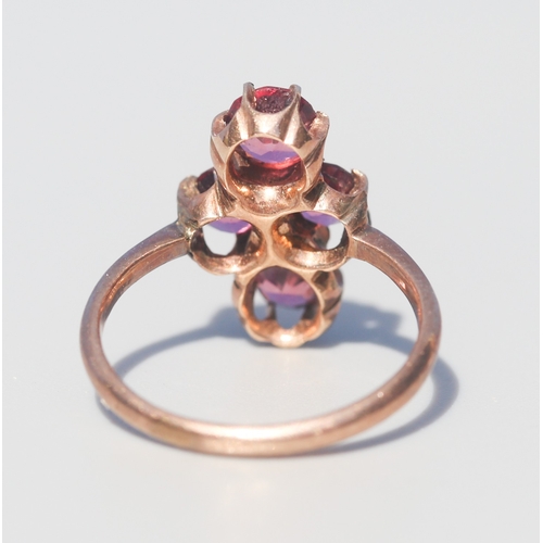 22 - Attractively Detailed, Pink Tourmaline Set Four Stone Ring, Mounted in 9 Carat Rose Gold, Ring Size ... 
