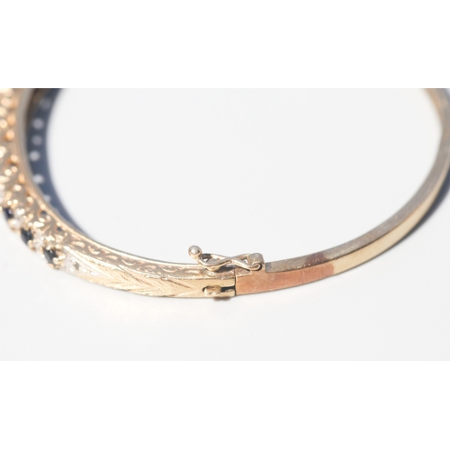23 - Finely Detailed, Eleven Stone Sapphire Set Bangle Bracelet with Diamond Insets, Incised Detail to Si... 