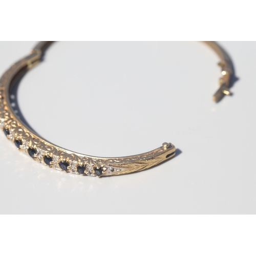 23 - Finely Detailed, Eleven Stone Sapphire Set Bangle Bracelet with Diamond Insets, Incised Detail to Si... 