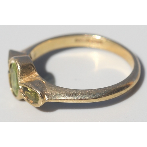 24 - Bezel Set Peridot Three Stone Ring, Mounted in 9 Carat Yellow Gold, Ring Size O and a Half
