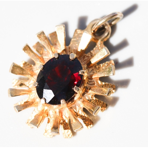 25 - Attractively Detailed, Garnet Set Sunburst Motif Pendant, Mounted in 9 Carat Yellow Gold, 2cm High